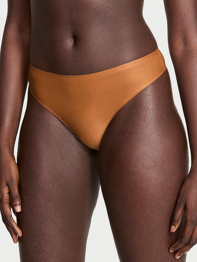 Body by Victoria Flex Mid-Rise Thong Panty image number 0